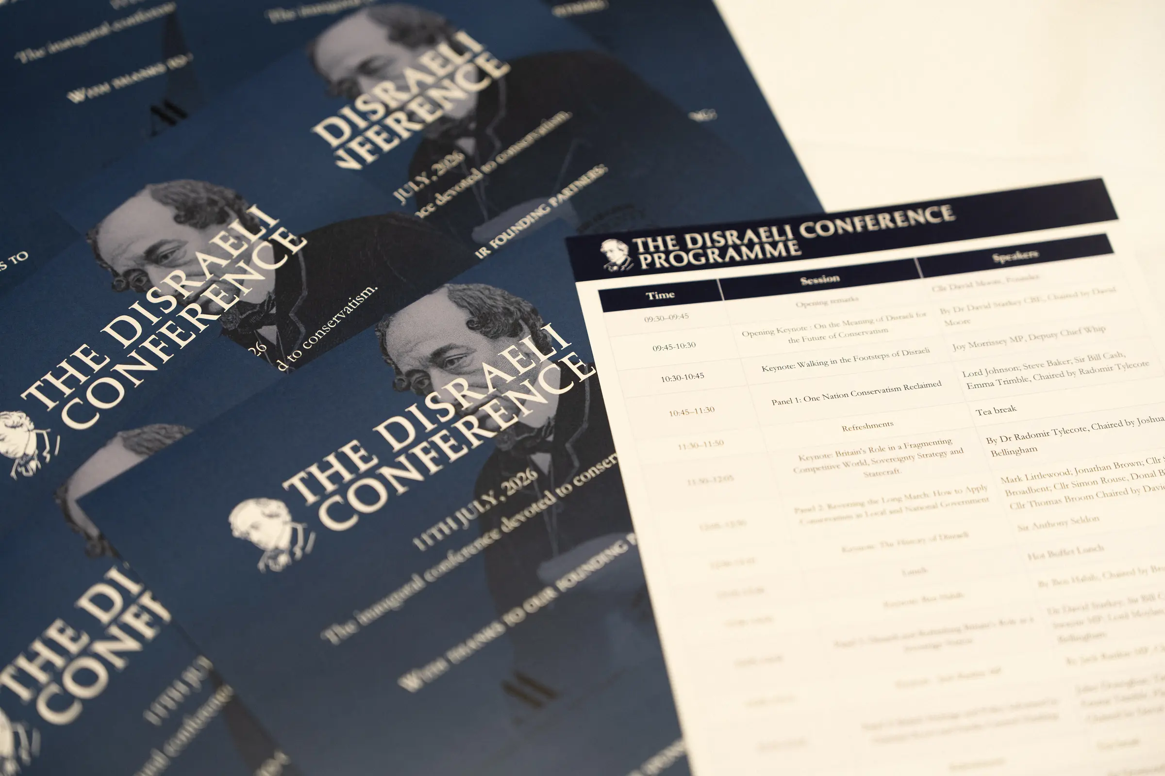 Printed Disraeli Conference brochures and the session programme laid out on a table